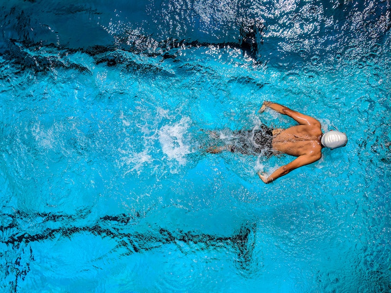 Men swimming in the pool